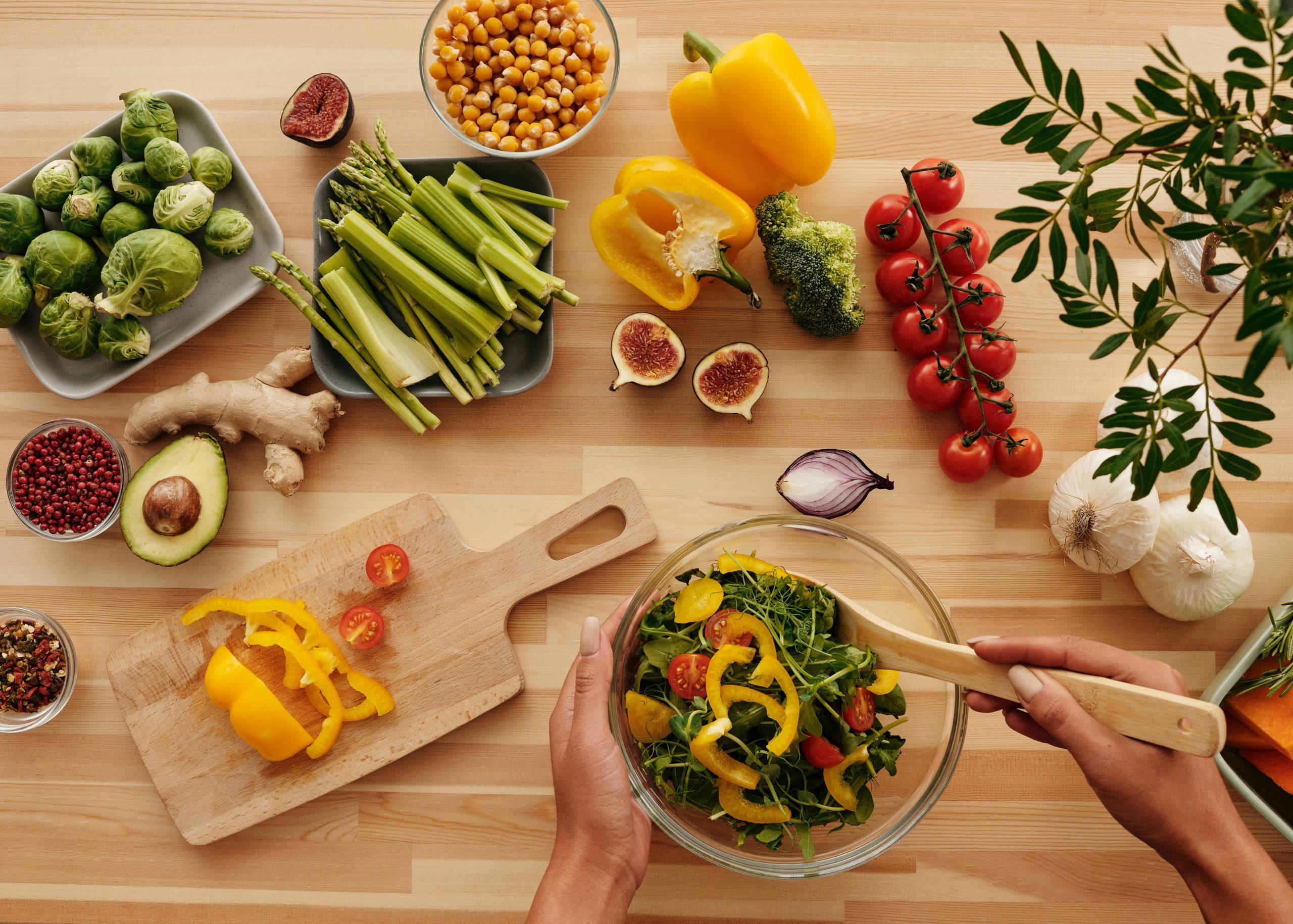 A spread of vegetables on wooden table