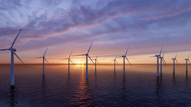 Offshore wind farm at sunset