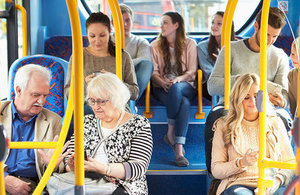 Bus passengers.