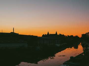 silhouette of building during sunset jigsaw puzzle online