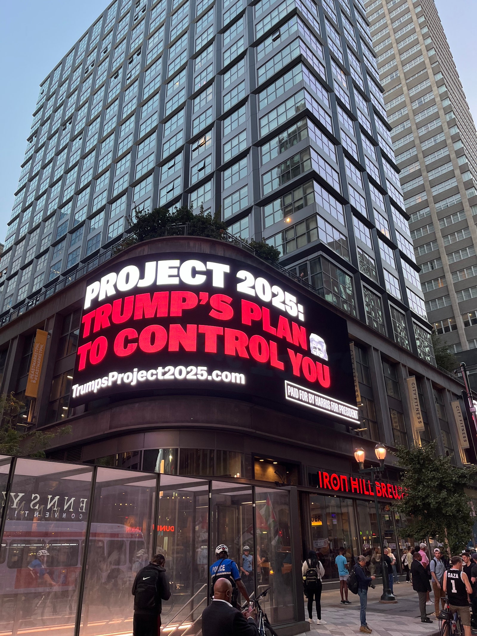 A Harris for President billboard in Philadelphia reads PROJECT 2025 TRUMP'S PLAN TO CONTROL YOU.