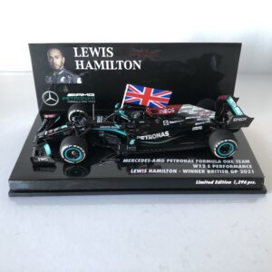 2021 Lewis Hamilton | Mercedes AMG Petronas W12 E Performance | Minichamps Diecast 1:43 | Winner British GP from the F1 Posters & Prints store collection.