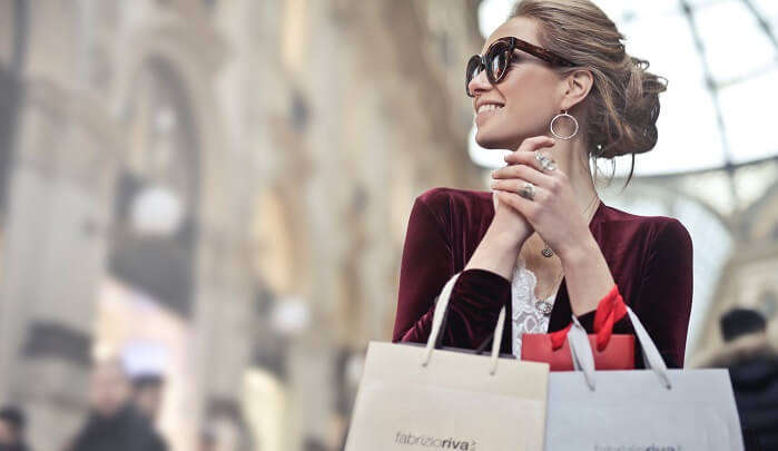 woman holding shopping bags