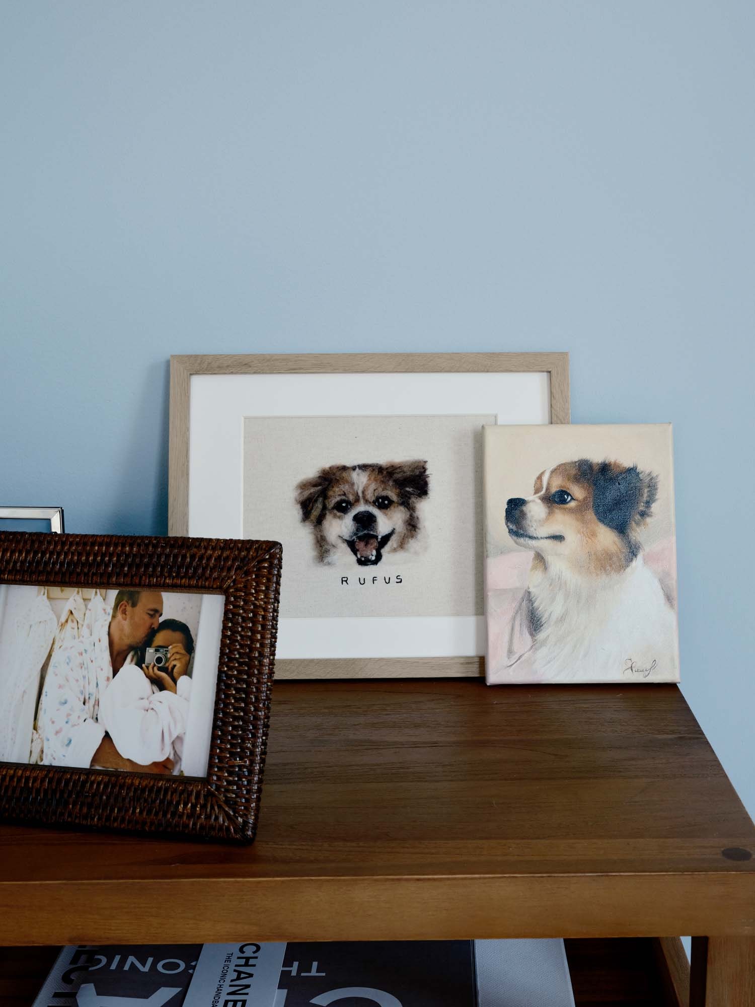 Image may contain Art Painting Animal Canine Dog Mammal Pet Person Photo Frame Camera and Electronics