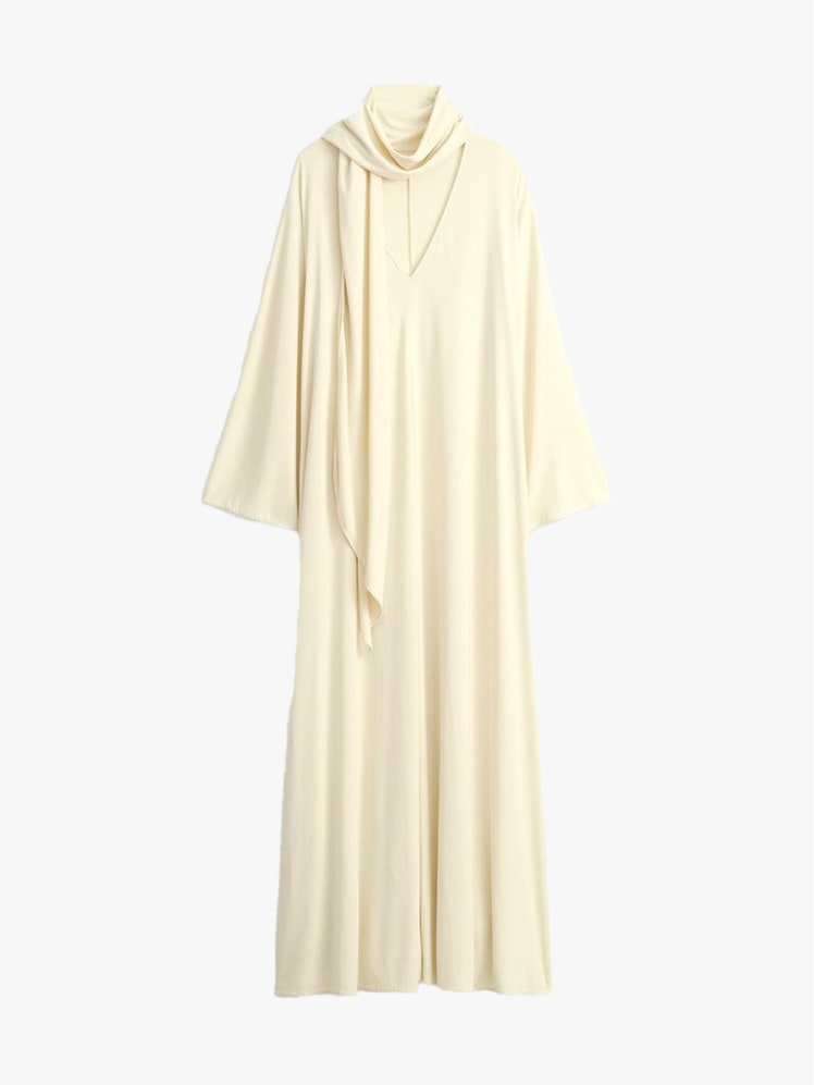 Image may contain Fashion Clothing Robe and Blouse