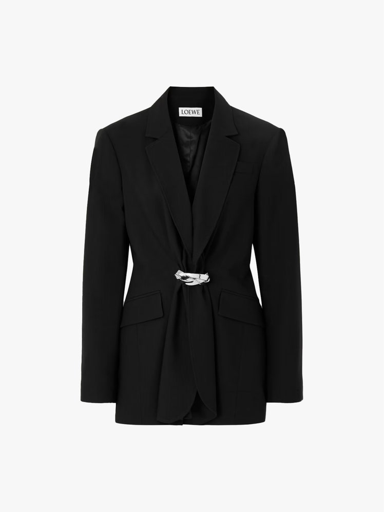 Image may contain Clothing Formal Wear Suit Tuxedo Coat Blazer and Jacket