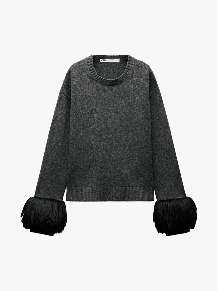 Image may contain Clothing Knitwear Sweater and Sweatshirt