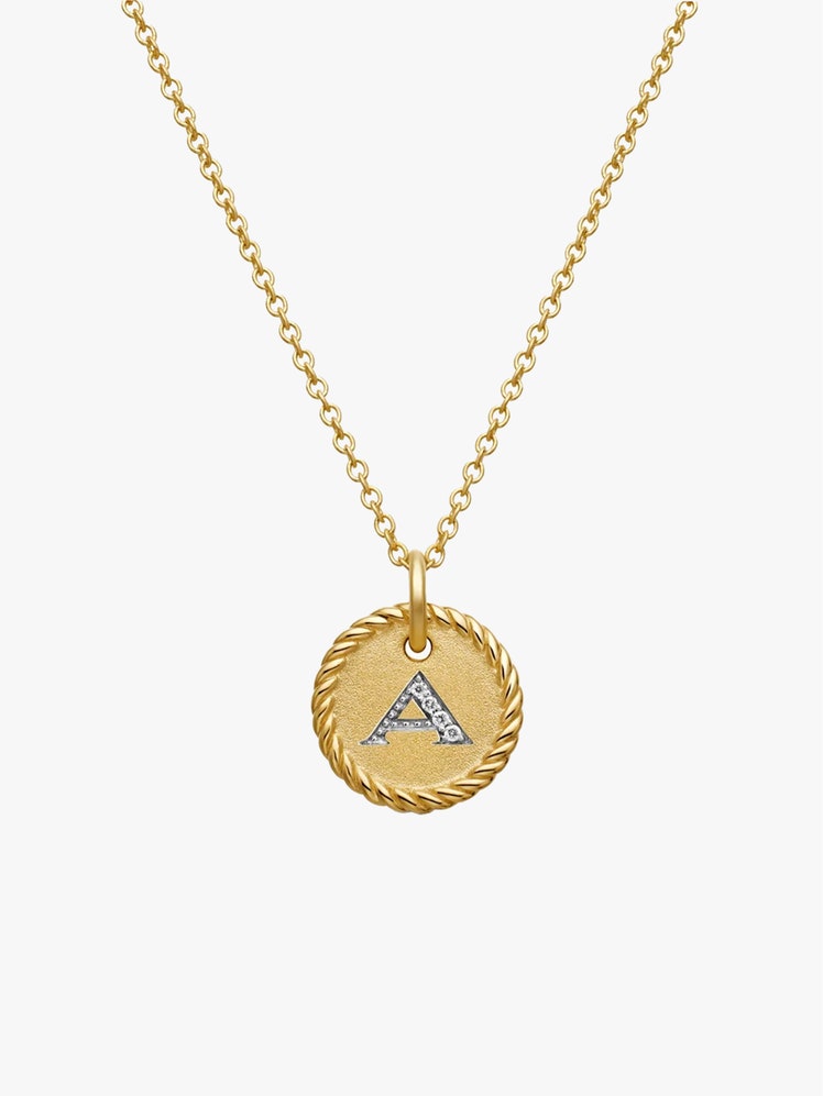 Image may contain Accessories Jewelry Necklace Gold Pendant and Locket