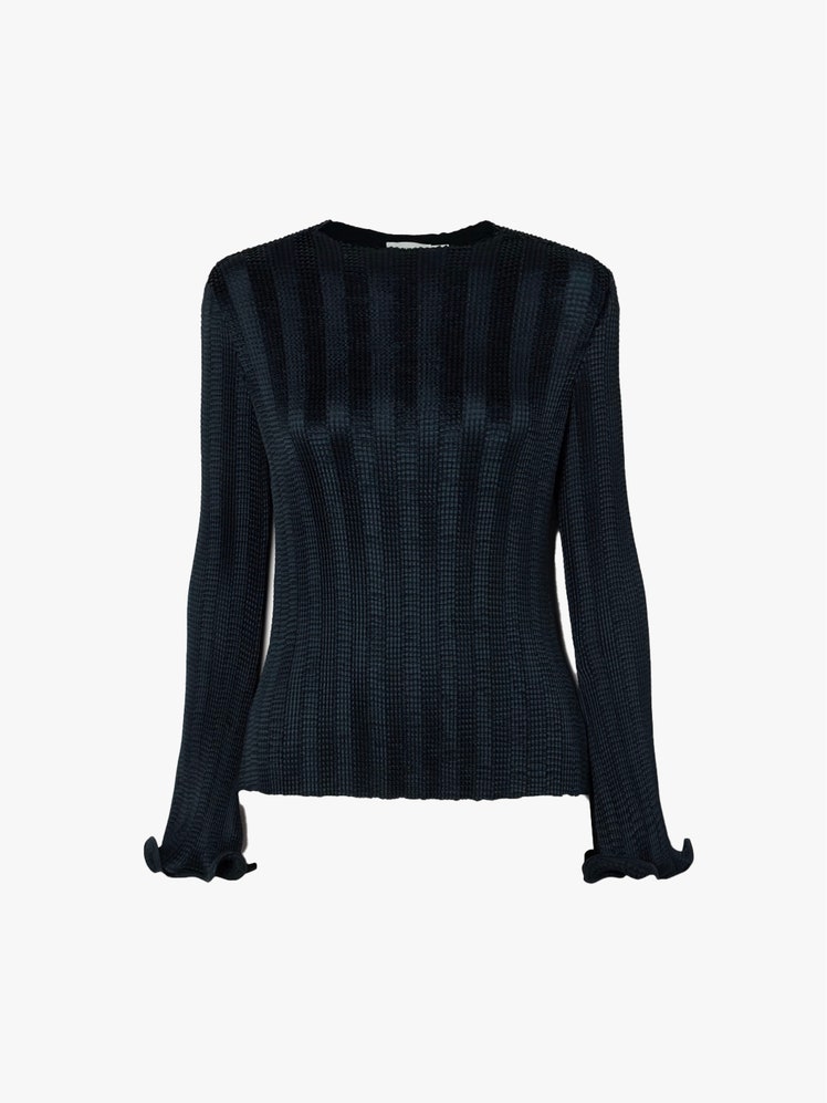 Image may contain Clothing Knitwear Sweater Long Sleeve Sleeve and Coat