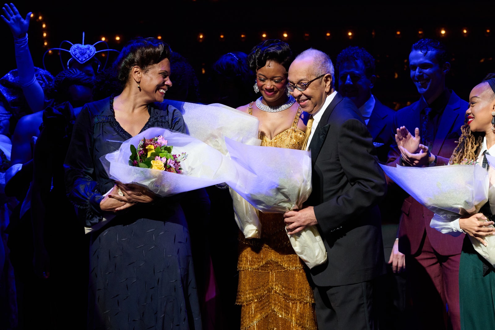 Image may contain George C. Wolfe Audra Mcdonald Camille A. Brown Accessories Glasses Flower and Flower Arrangement