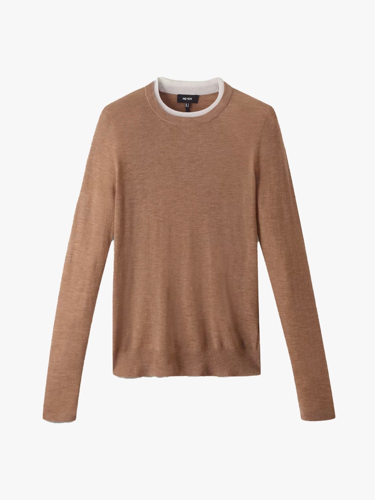 Image may contain Clothing Long Sleeve Sleeve Knitwear Sweater and Sweatshirt