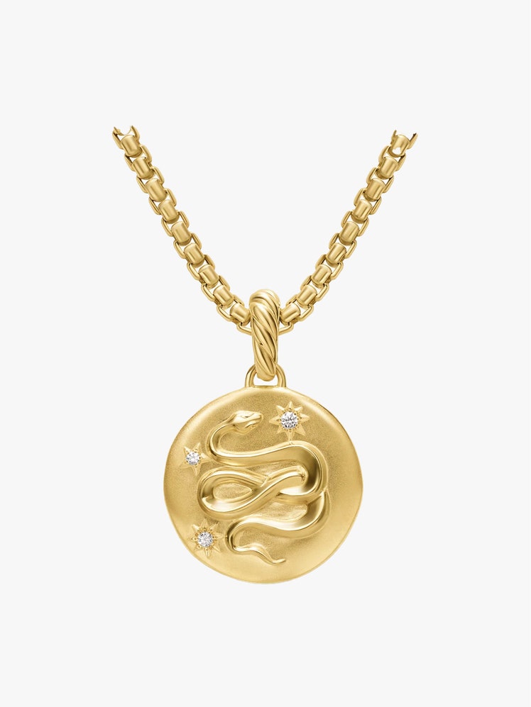 Image may contain Accessories Jewelry Necklace Gold Pendant and Locket