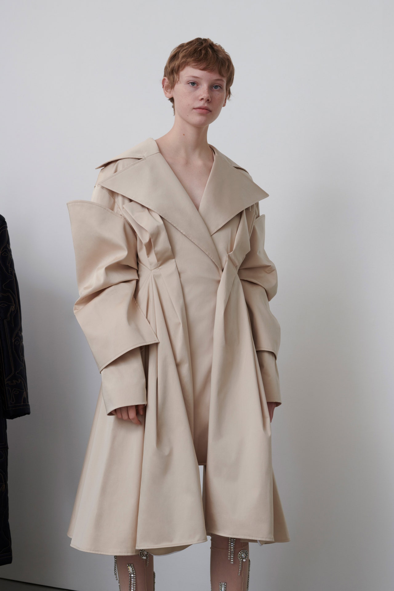 Image may contain Roma Gąsiorowska Clothing Coat Overcoat Trench Coat and Person