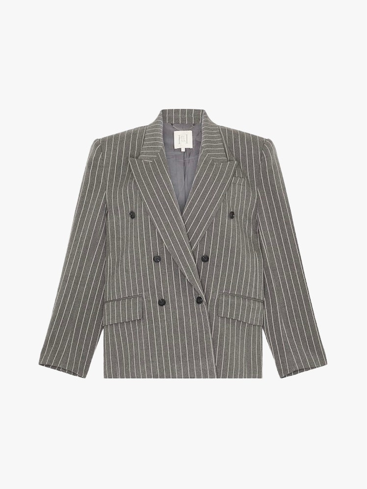 Image may contain Blazer Clothing Coat Jacket Formal Wear and Suit