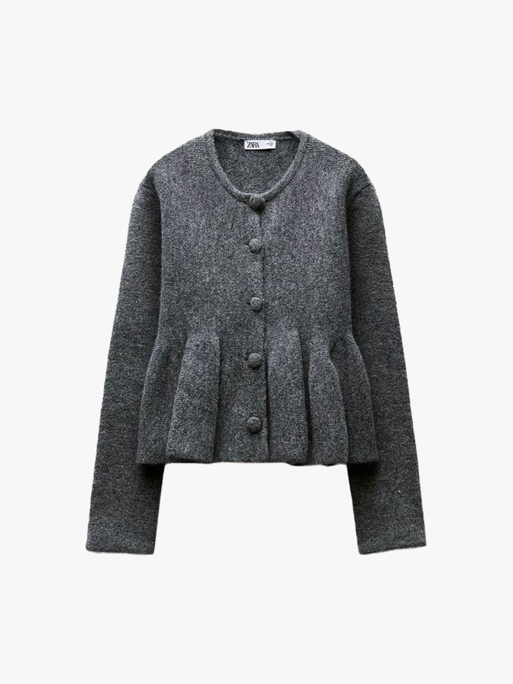 Image may contain Clothing Knitwear Sweater Coat and Cardigan