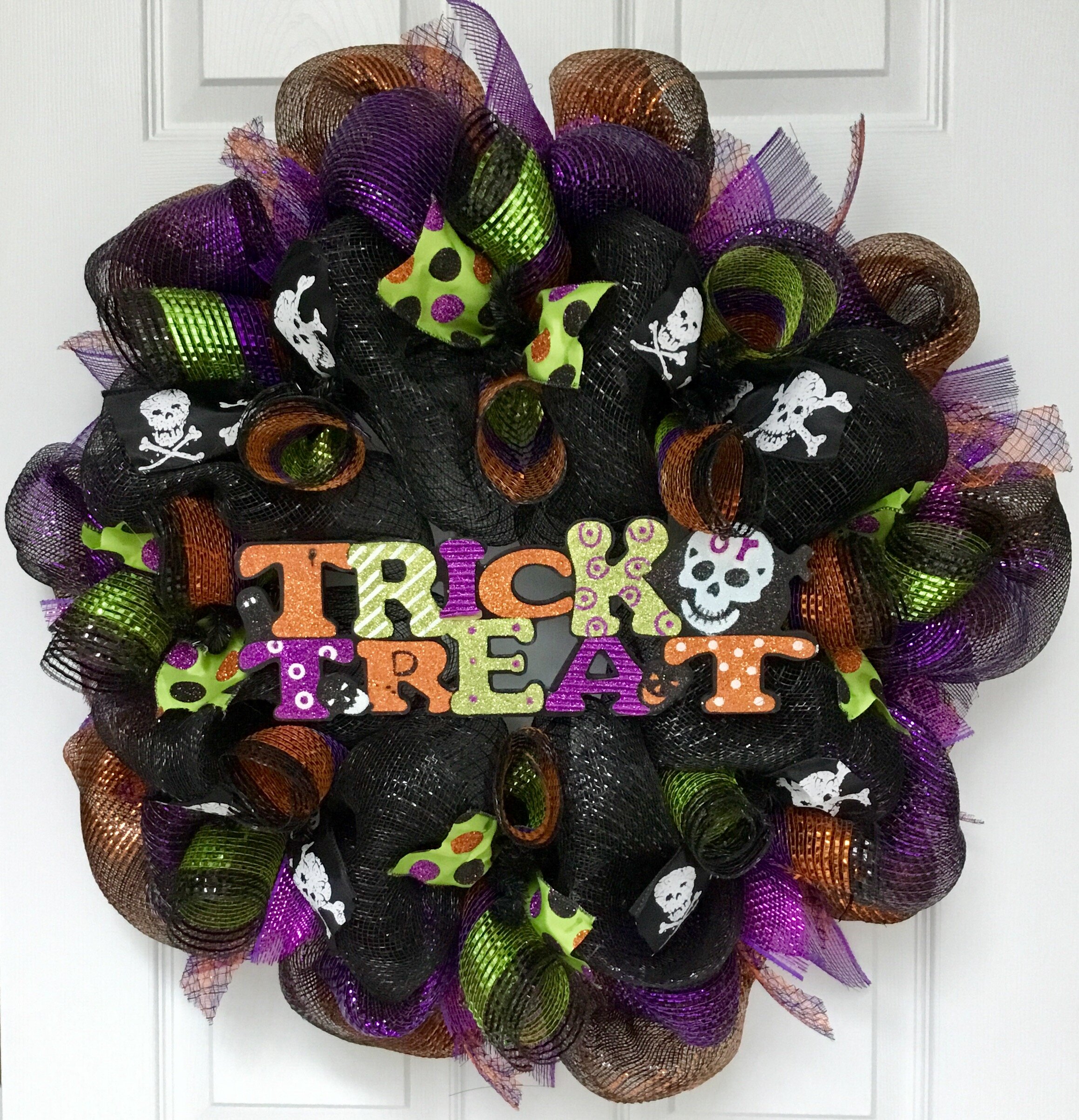 The Holiday Aisle® Halloween Wreath Trick or Treat with Skull | Wayfair