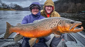 Donald Cranor white river guide with trout