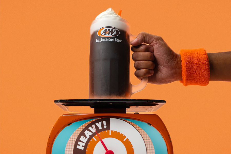 Root Beer Float in an A&W mug being placed on a scale.