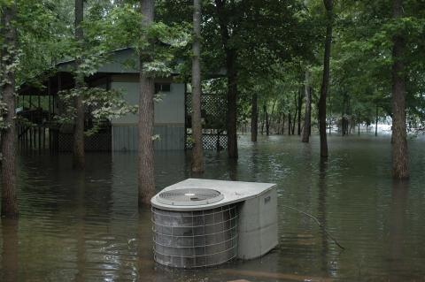 Wrong – The HVAC compressor was not adequately secured to an elevated platform and was washed away.