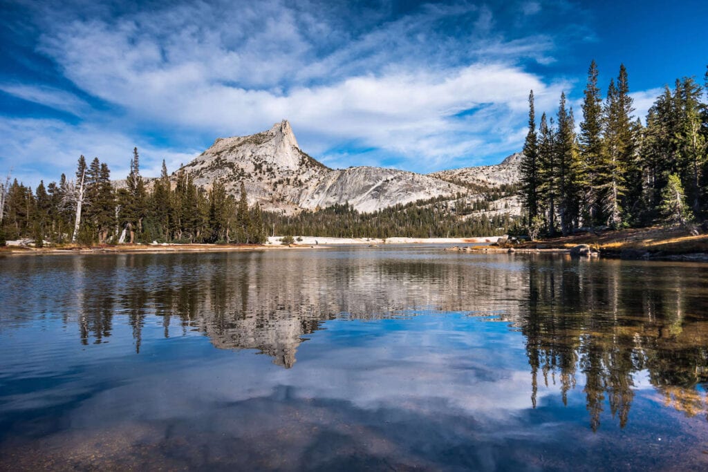 Reflection of mountains on Cathedral Lake in Yosemite National Park