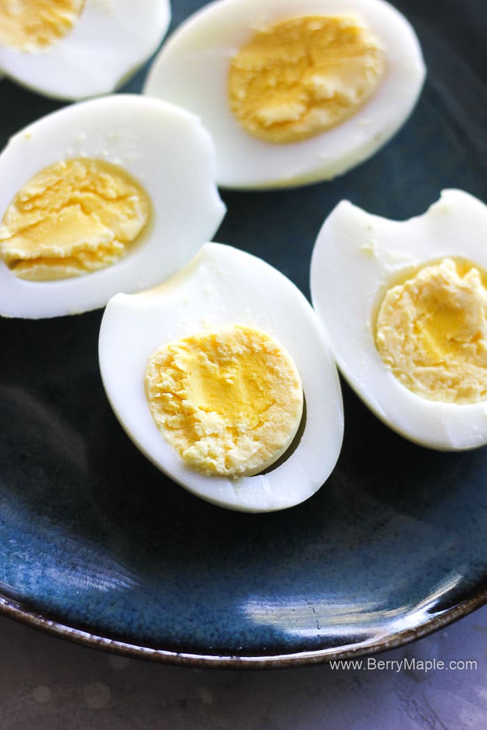 hard boiled eggs on a blue plate