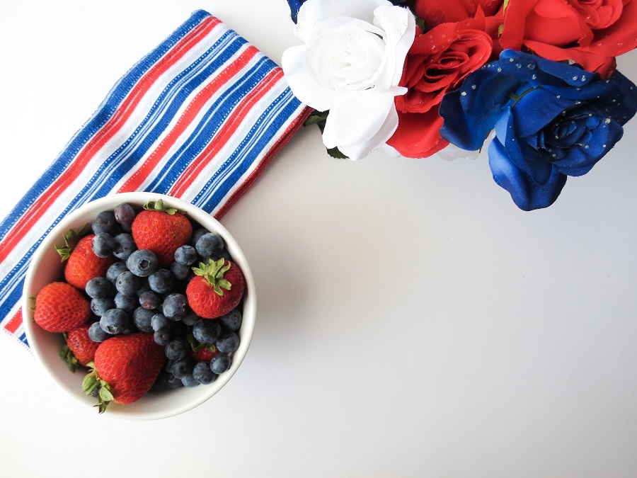 Red White and Blue Margarita Recipes a Bowl of Berries with a Bouquet of Red White and Blue Flowers and a Towel with Red White and Blue Stripes