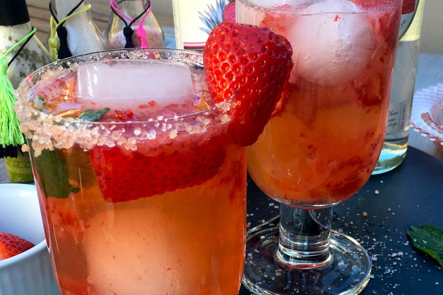 Light Strawberry Margarita Recipe Close Up of Two Glasses of Margarita Garnished with Strawberries