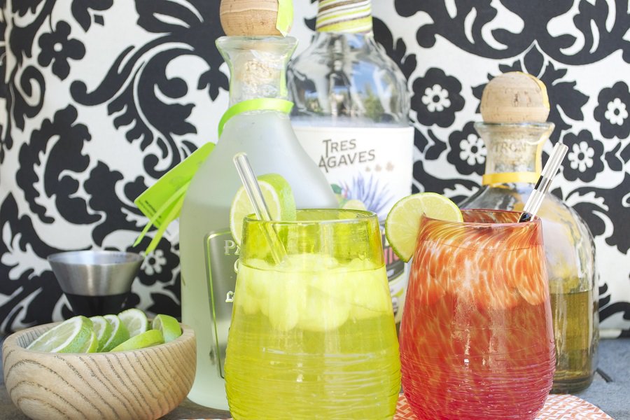 Patron Margarita Recipe Close Up of Two Glasses of Margarita Next to a Bottle of Patron, Agave, and other ingredients