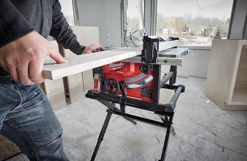 Man using a Milwaukee Table Saw