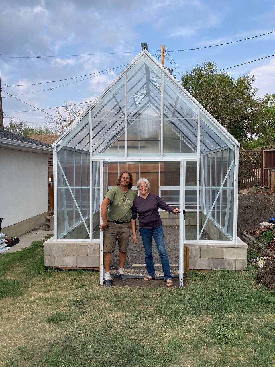 White Cape Cod Greenhouse