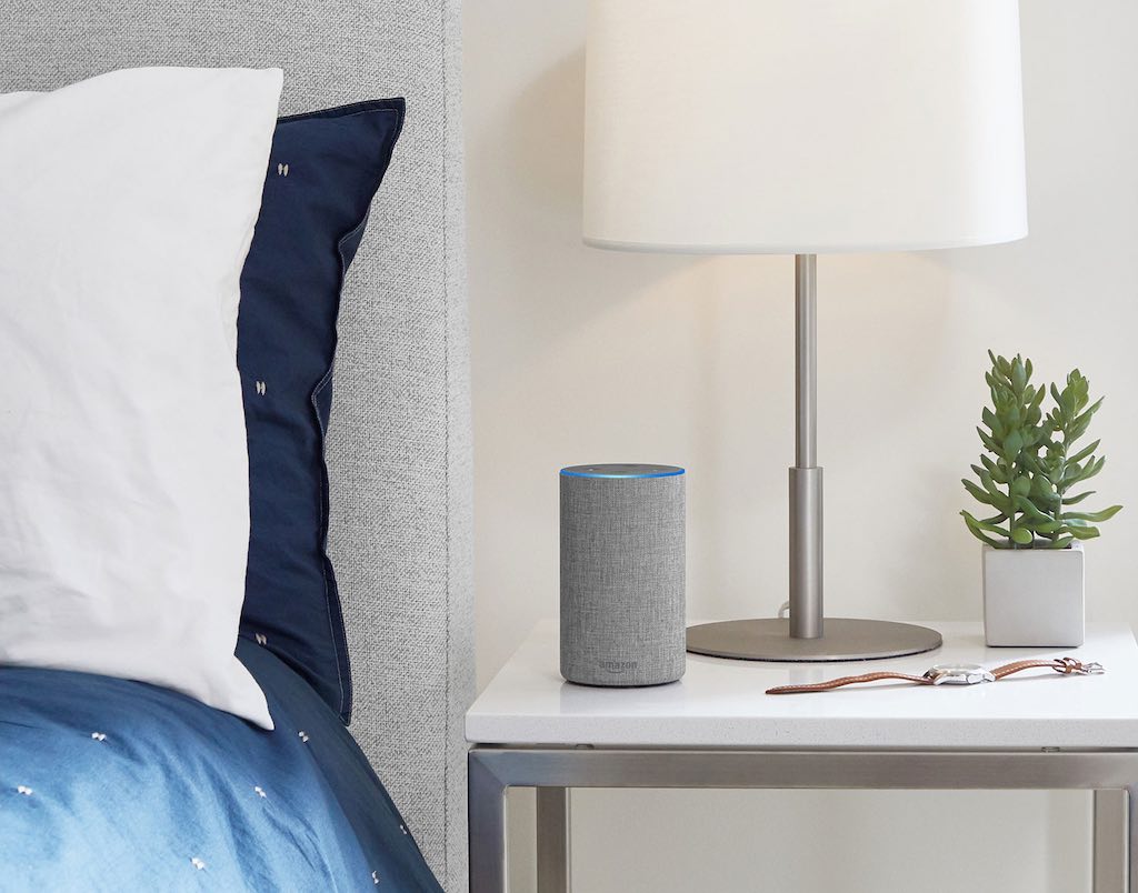 Amazon Alexa - Grey Fabric - on a bedroom nightstand