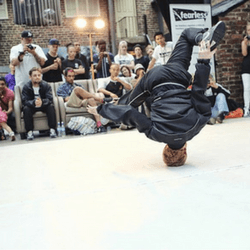 A person dancing, representing the idea of a dance-off fundraising idea.