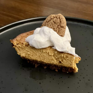 Pumpkin pie slice with gingersnap crust