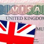 United Kingdom visa in passport with Flag of the UK.