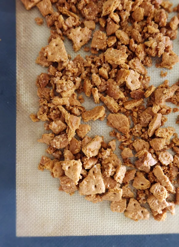 baked graham cracker streusel on silicone mat