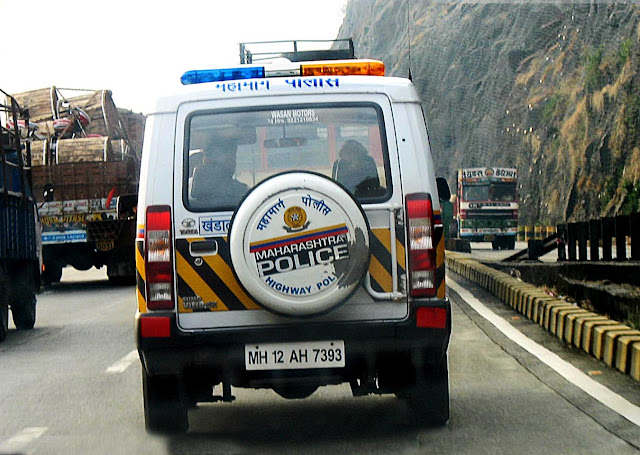 police jeep on highway