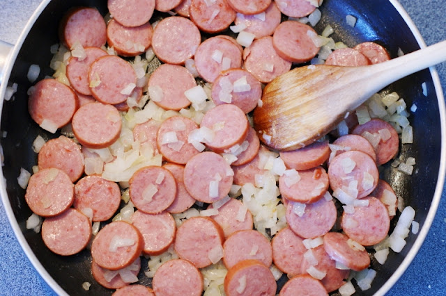 Sauteing Smoked Sausage with Onions Image