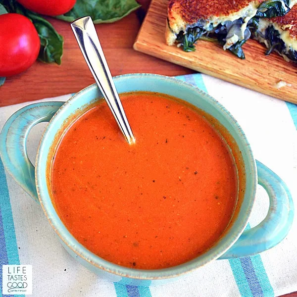 Tomato Basil Soup | by Life Tastes Good is the tomato soup recipe of my dreams! Yes, I dream about delicious tomato basil soup! Fresh roasted vegetables and herbs. Healthy, delicious, and easy to make too!