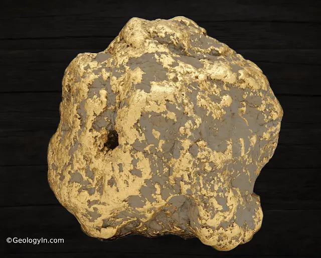 photo of the Alaska Centennial Gold Nugget, the largest gold nugget ever found in Alaska. It's a large,