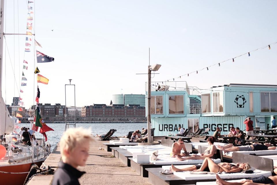 Sunbathing in front of the Urban Rigger student housing