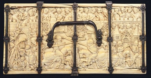 Lid of box with black handle and stone carvings of people and city