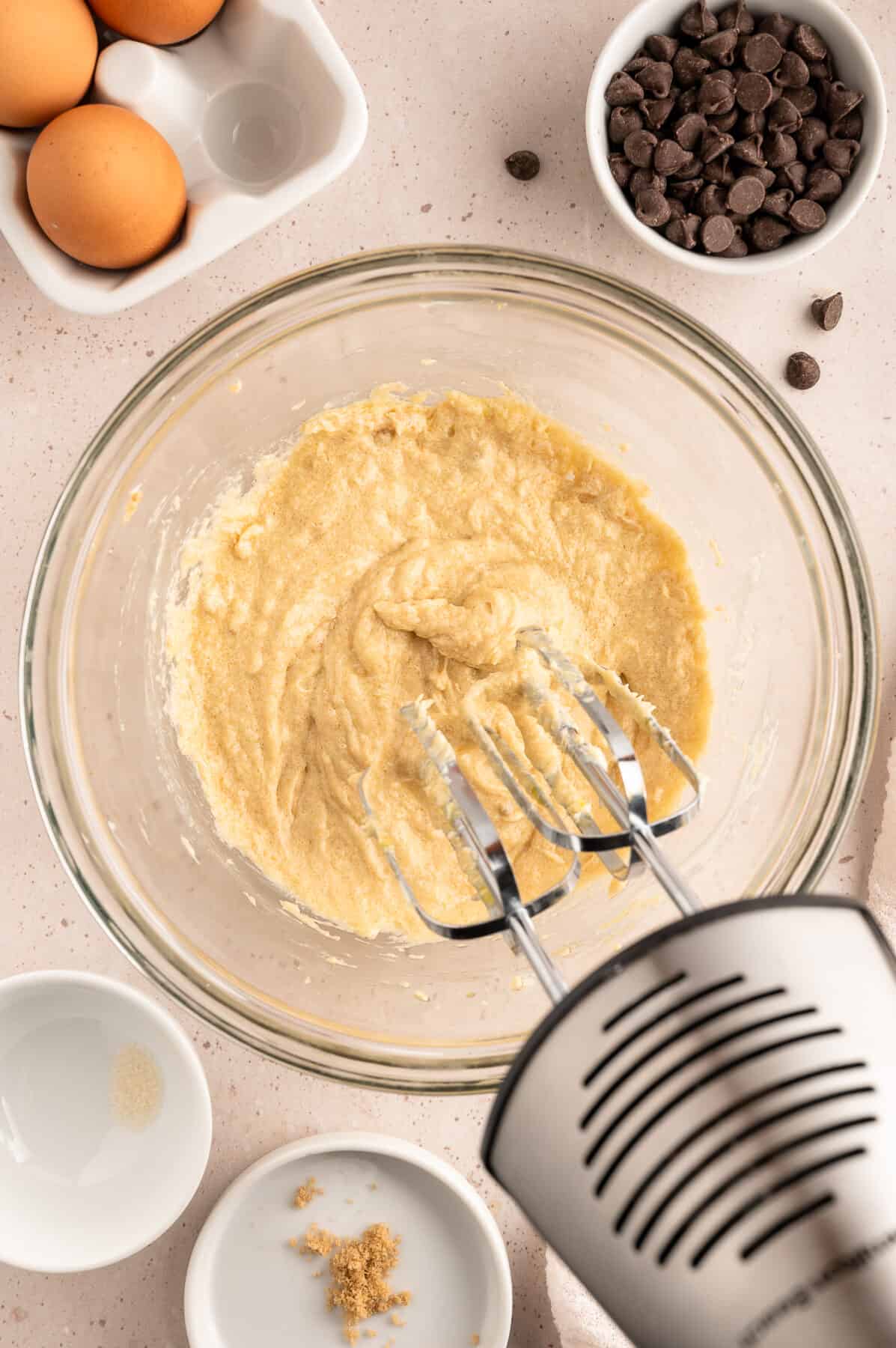 mixing the egg into the butter and sugar mixture. 