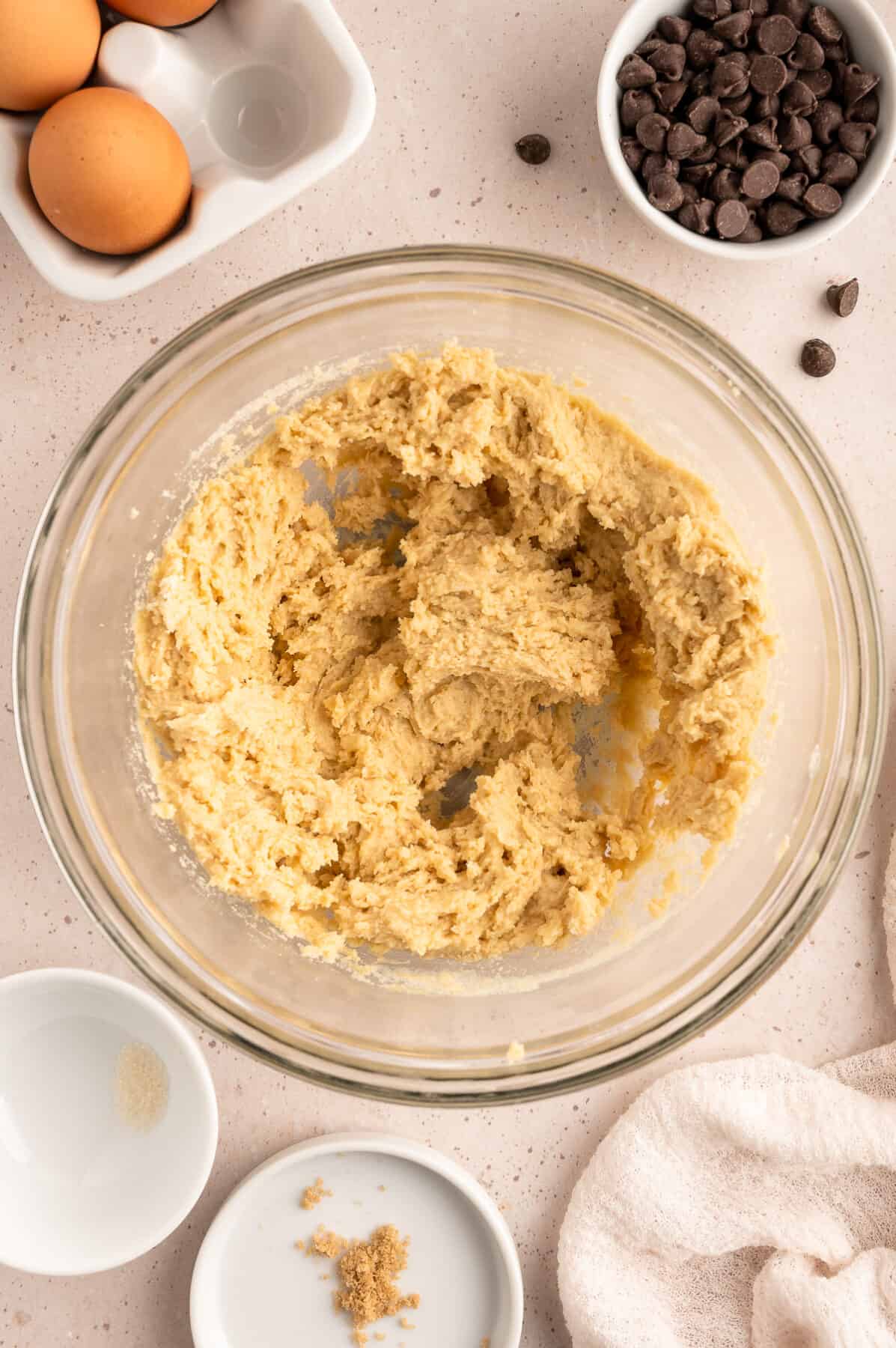 combining the dry ingredients with the creamed butter mixture. 