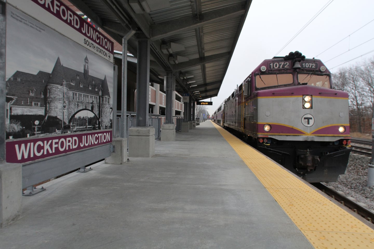 A commuter rail train approaches the station in Wickford Junction, R.I. Rhode Island officials would like to see the MBTA launch express trains from the state to Boston — a move the T says would be difficult to pull off.