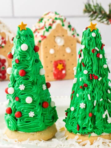 Festive sugar cone Christmas trees on a platter.