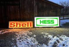 No Reserve: Illuminated Shell and Hess Signs