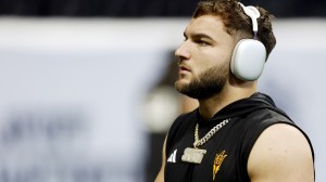 Arizona State running back Cam Skattebo on the field before a game.