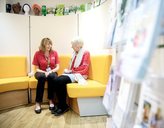 Volunteer talking to patient