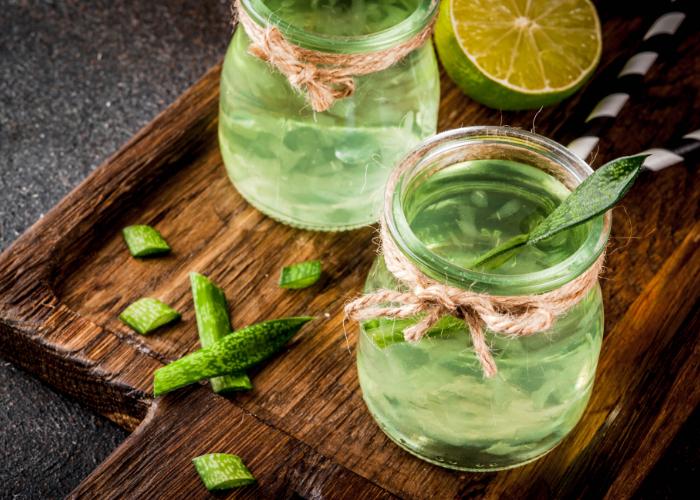 Japanese aloe drink: cups of green liquid with aloe pulp floating inside