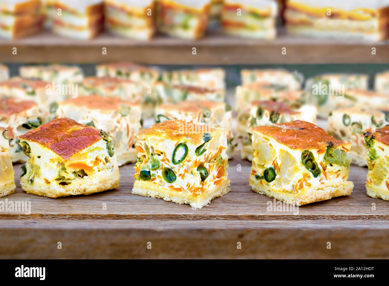 Catering background. Slider bar background. Cheap catering service. Tasty  and healthy food. Street food for guests. Pieces of Pudding on wooden  backgroud. Corporate events. Catering for any event Stock Photo - Alamy